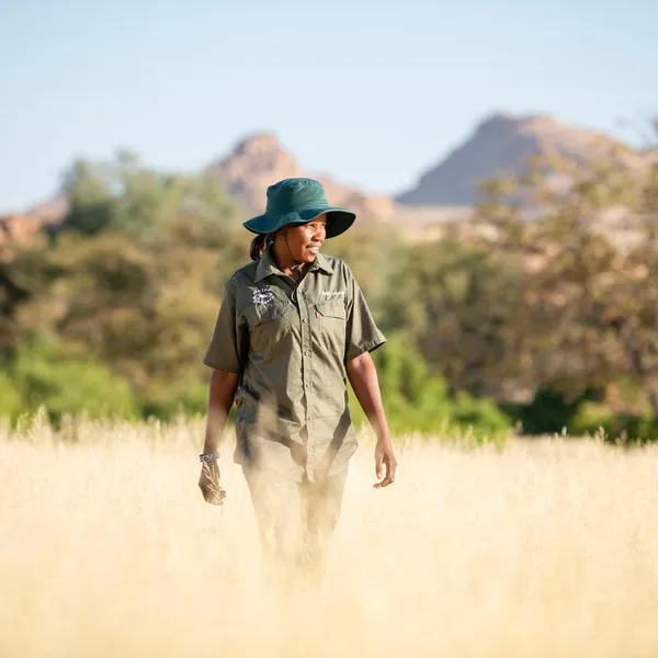 Rhino ranger Erlyn Touros looks for rhino tracks in the Uibasen Twyfelfontein Conservancy, Namibia