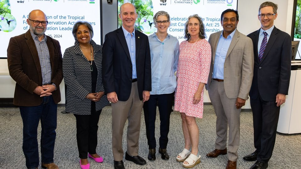 A small group of conservation and policy leaders pose at the recent gathering to celebrate succesful debt for nature swaps