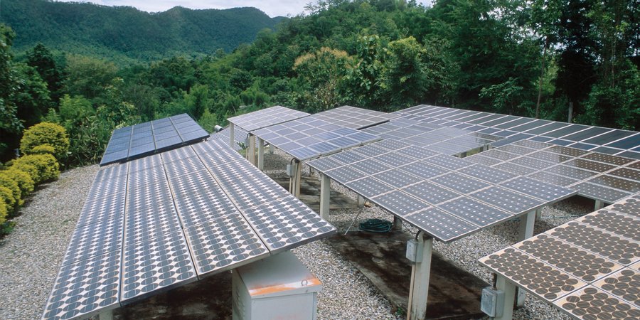 Solar panels in mountain landscape