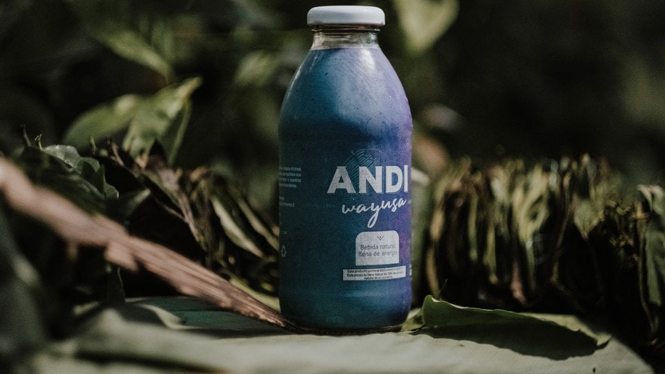 A blue bottle with the words "Andi WayUSA"