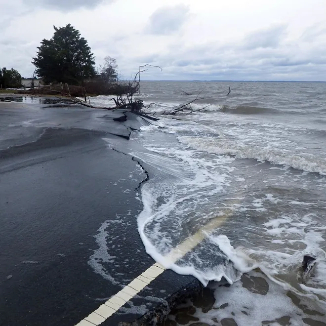 A street that's broken floods during a storm
