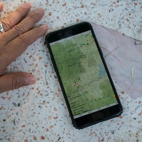 A smartphone on a table showing a map
