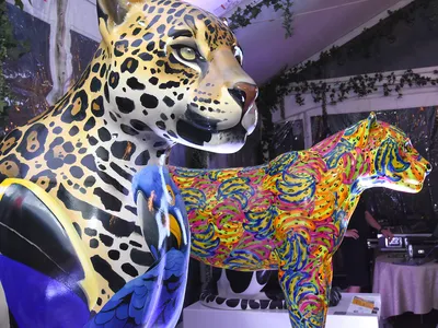 Two large jaguars made from plaster to be used in floats for a jaguar parade.