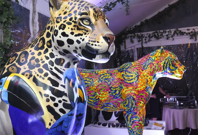 Two large jaguars made from plaster to be used in floats for a jaguar parade.