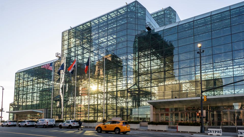 Sunlight shines through the glass walls of the Javits Center in New York