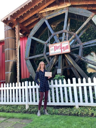 Julia Person stands in front of Bob's Red Mill