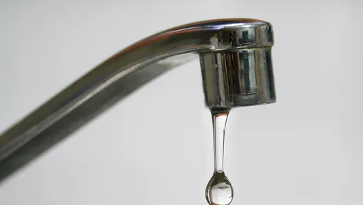 A faucet dripping water