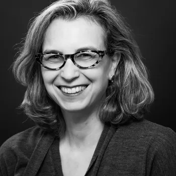 A black and white headshot of Loren.