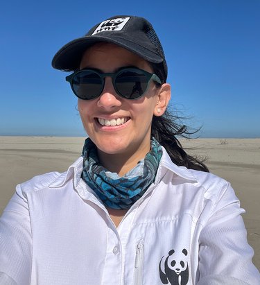 Selfie of woman with cap and sunglasses