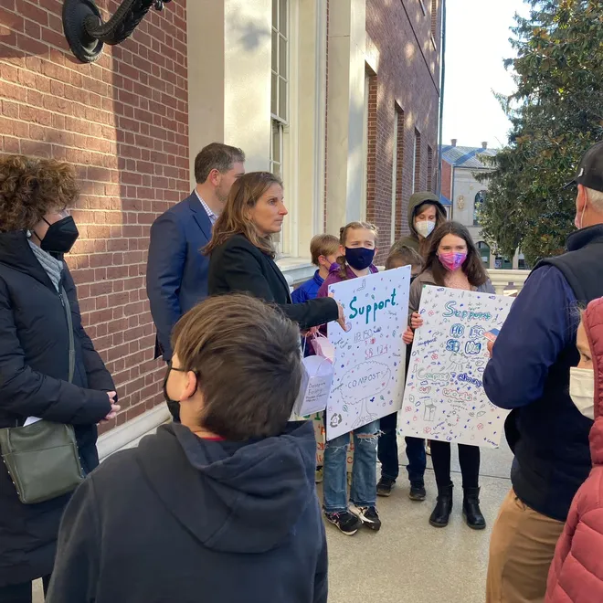 Montgomery County Food Waste youth team gathering at a government building to advocate for a food waste bill.