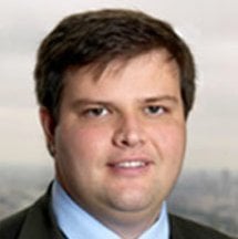 A headshot of a man