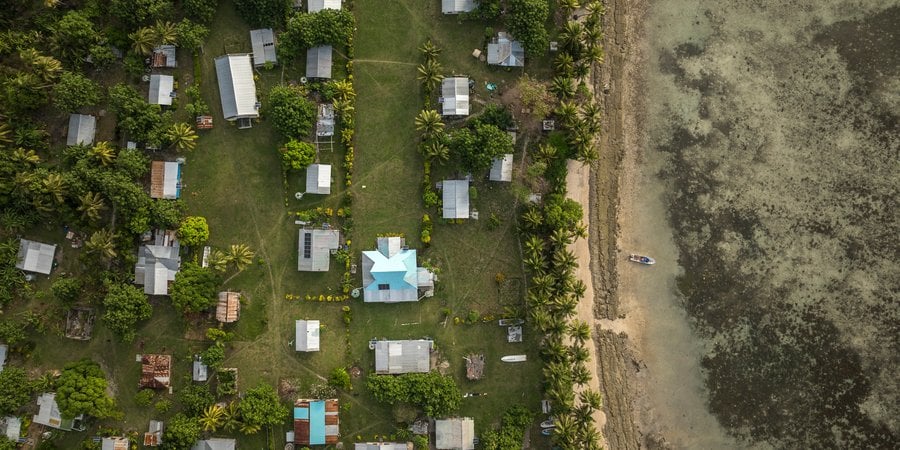 Aerial view of coastal Nacula Village on Yasawa Islands, Village
