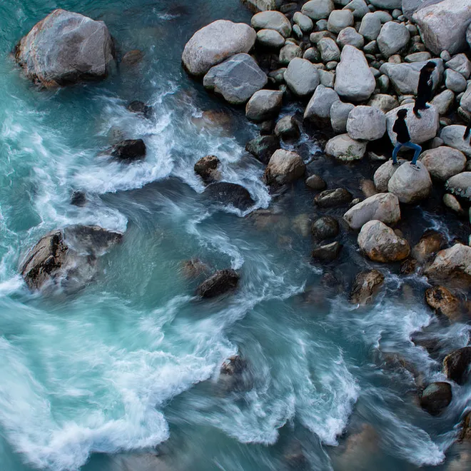 Aerial photo of riverside with rocks