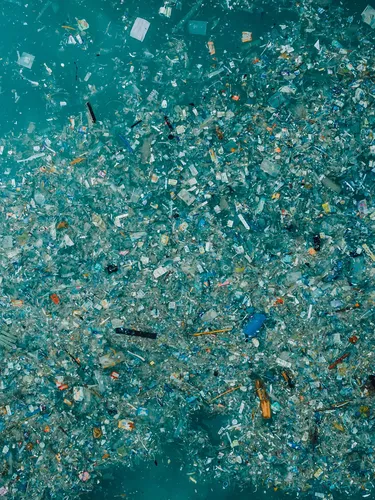 Thousands of pieces of colorful plastic float in the ocean