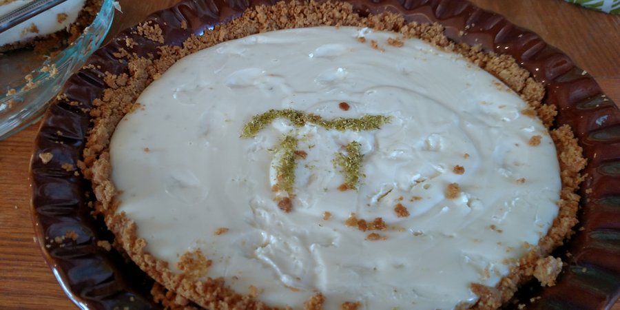 a key lime pie with the pi symbol on top
