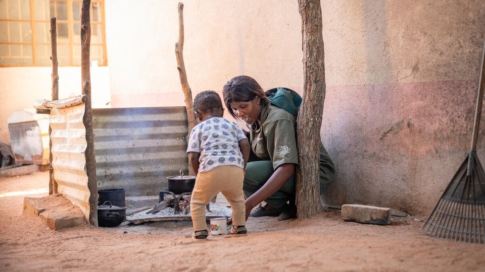 Eryln Touros sits with her nephew at her home in the Uibasen Twyfelfontein conservancy, Namibia