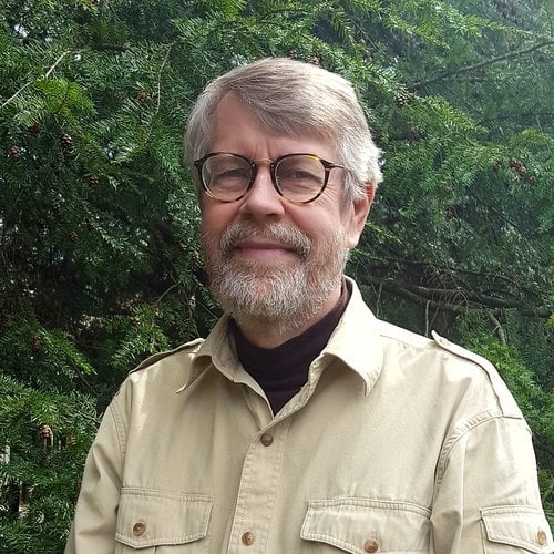 Headshot of Richard Rosen with trees in the background