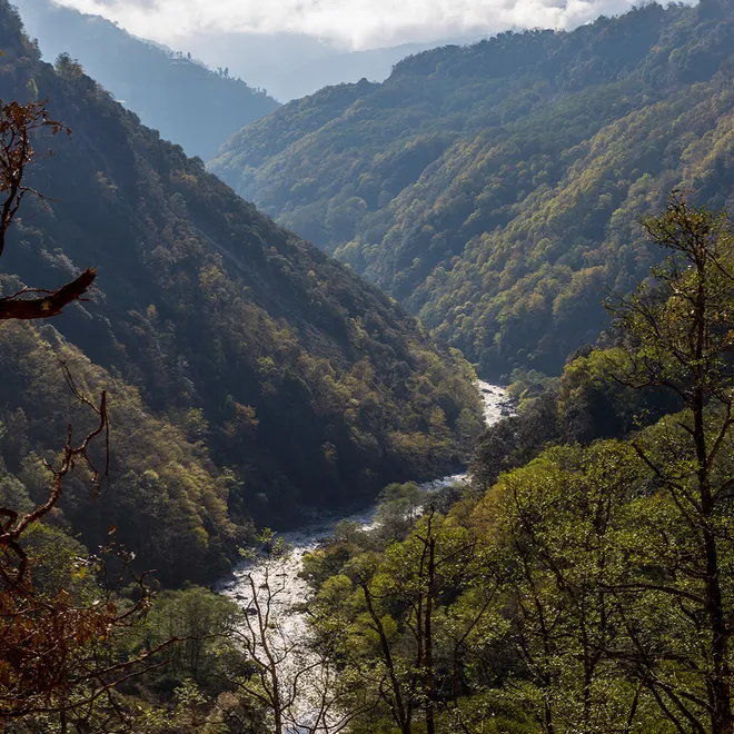 A river running through a valley in Trongsa district, Bhutan.