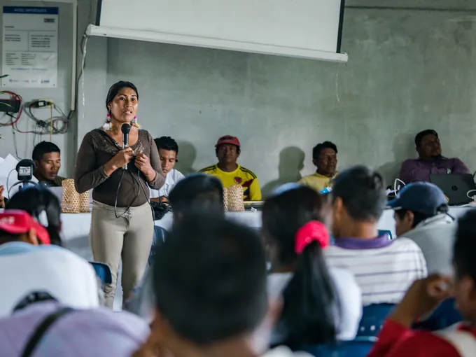 Chela Elena Umire speaks about the work and findings of the local EcosystemServices Assessment (ESA) Technical Team to leaders of the local indigenous community at LaChorrera's Annual General Meeting.