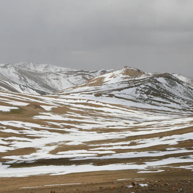 A mountain range covered in snow