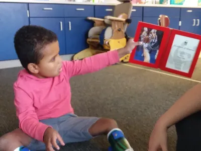 Child interacting with Wild Classroom materials