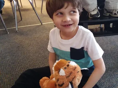 Child interacting with Wild Classroom materials