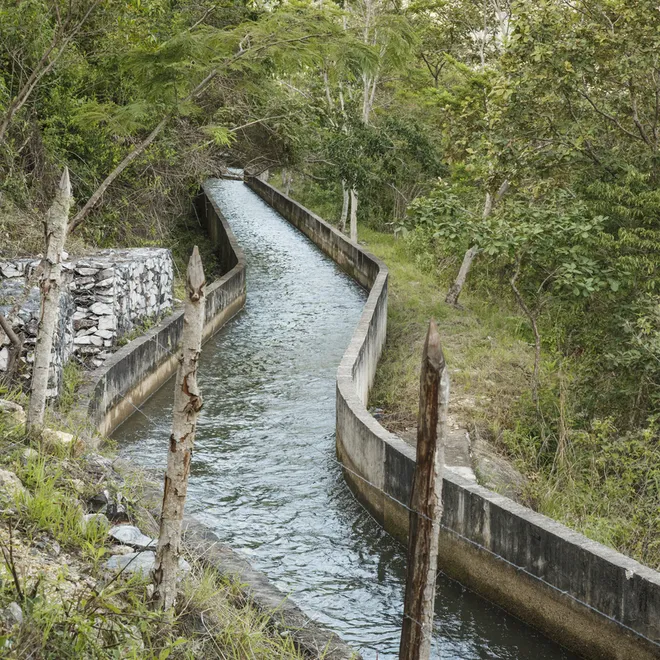 An acquaduct streaming water downhill from the Sierra de las Minas, a moutain range in eastern Guatemala.