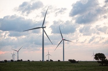 Several windmills against a morning sky