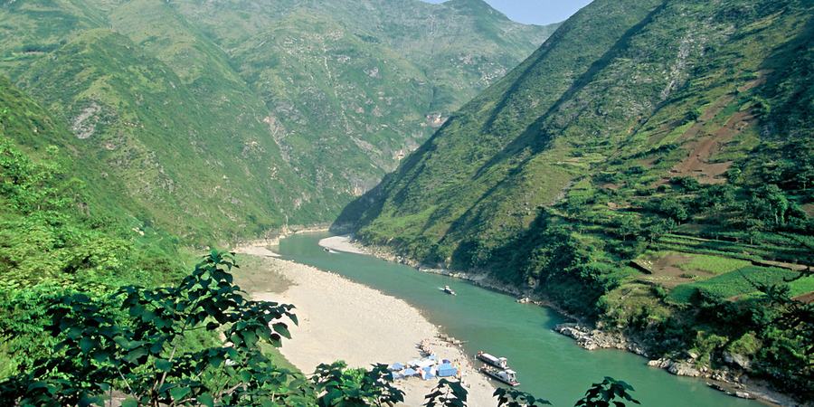 River running through mountains