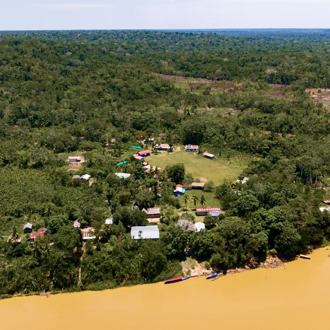Aerial photo of village in Madre de Dios