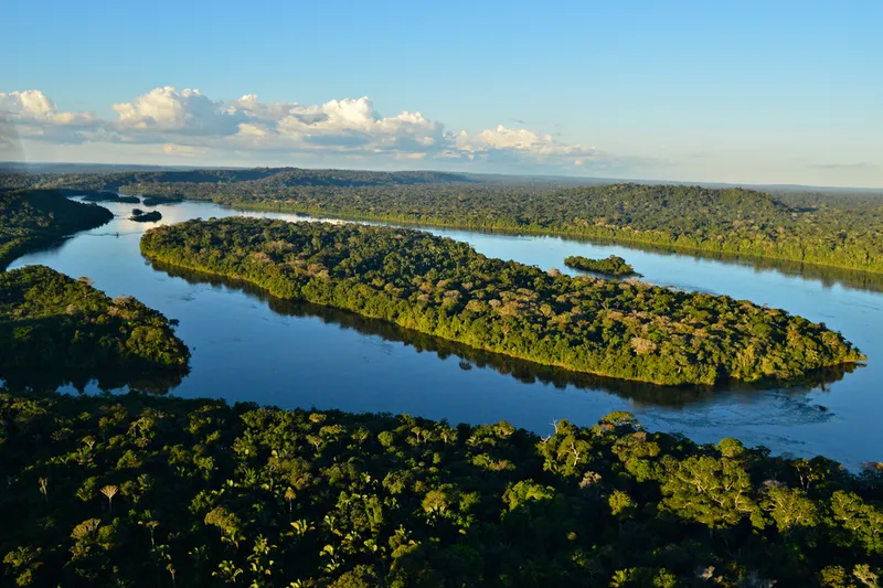 Overview of the winding Juruena river, Juruena, Brazil. The forest landscape and river is vast.