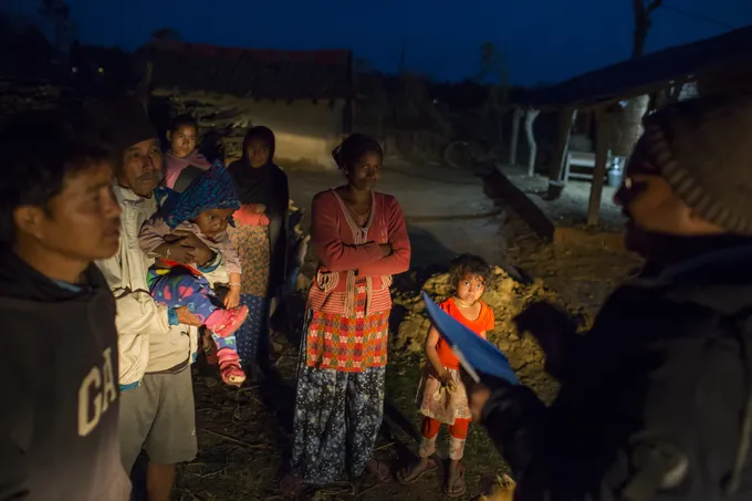 Rapid Response Team is arriving in a house to help villagers to deal with a wildlife conflict. Khata Corridor, Nepal.
