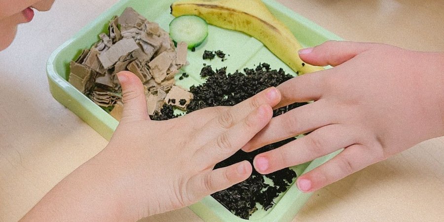 children with different compost material