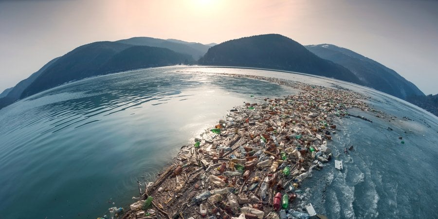 an island of trash in a body of water
