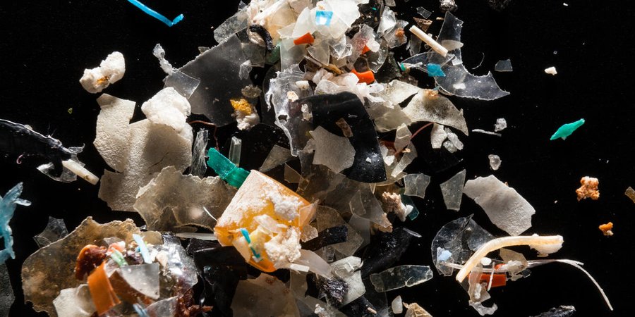 photo of plastic floating on top of water